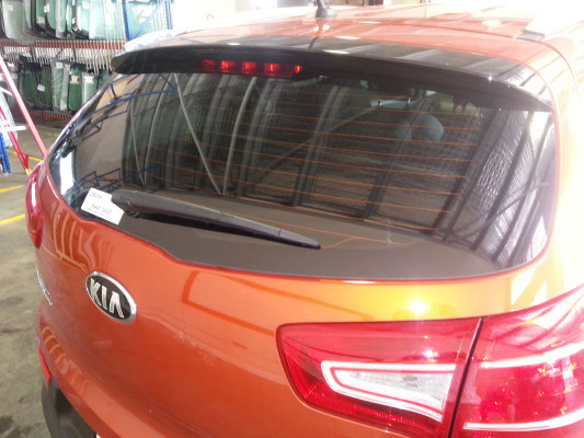 close up rear view Kia Sportage SUV with darkest legal car window film in Australia