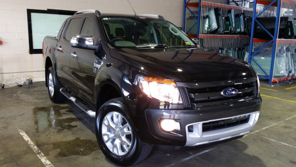 front view black colour Ford Ranger pick up truck window tinted onsite in Logan city Brisbane