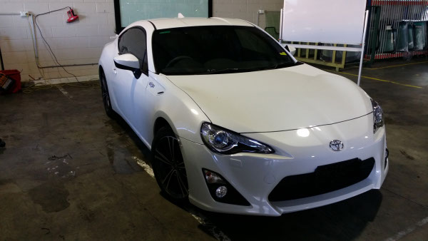 front view white colour Toyota 86 Series sports car windows tinted