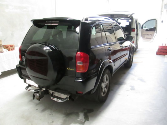 rear view black colour Toyota RAV4 old window film replaced with new window tint