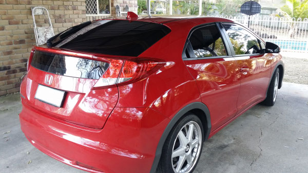 rear view Honda Civic hatchback car windscreen tinted in Beenleigh City of Logan Queensland Australia