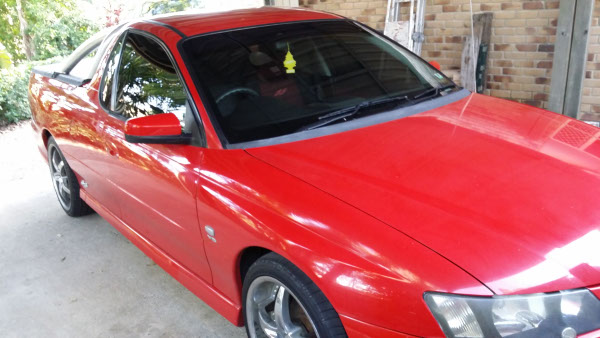 red colour Holden SS Commodore Ute windows tinted