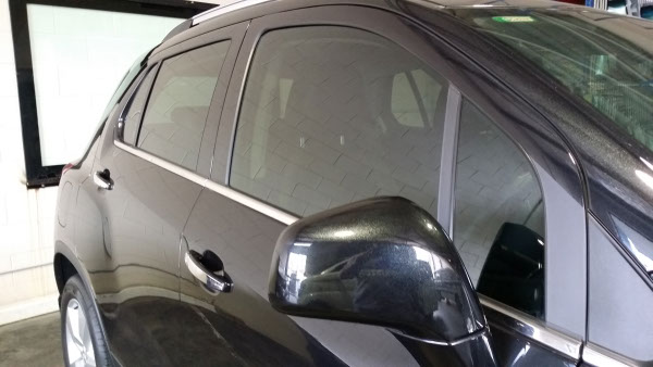 side view of car window tinting completed on Holden Trax five seat SUV